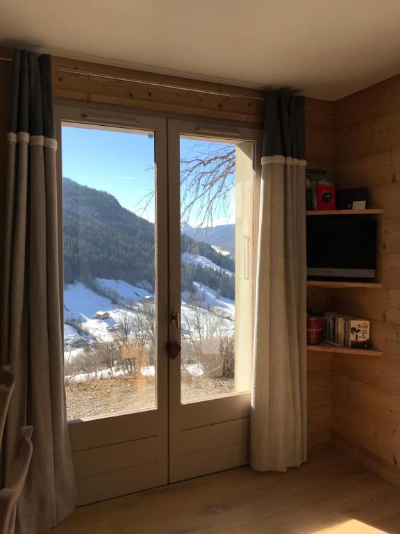 Nespecifikovaný výhled na hory nebo výhled na hory při pohledu z apartmánu