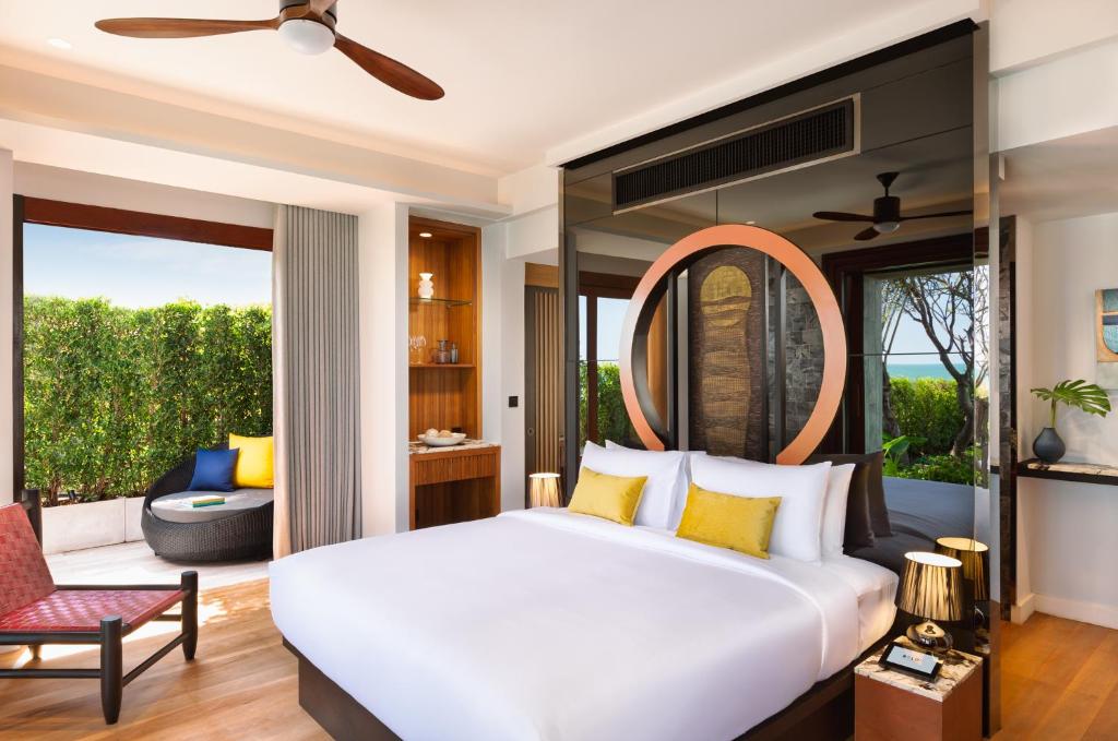 Postel nebo postele na pokoji v ubytování RELO' The Urban Escape - Huahin