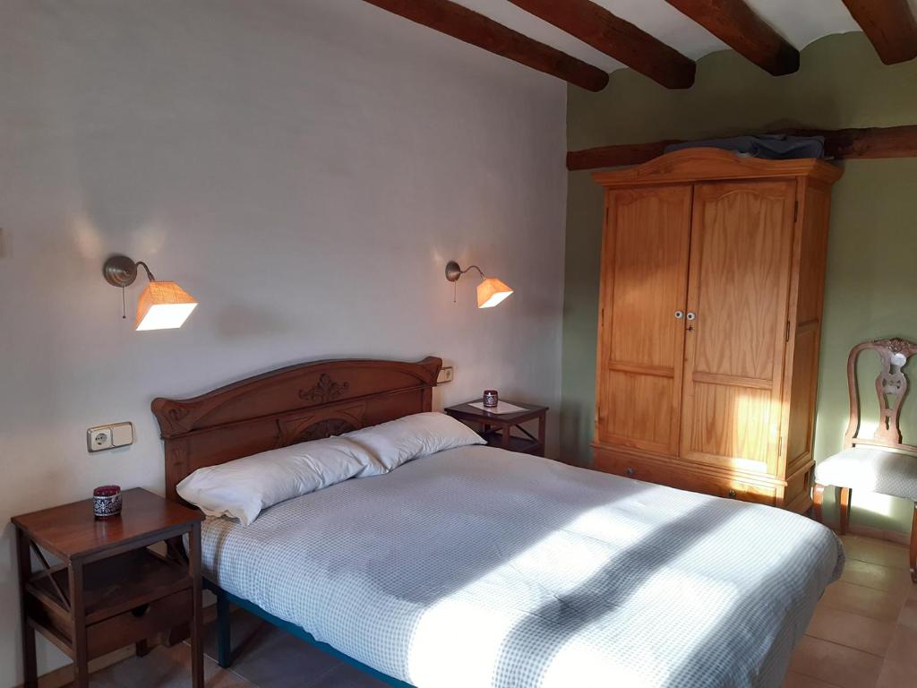 Postel nebo postele na pokoji v ubytování Casa Miret