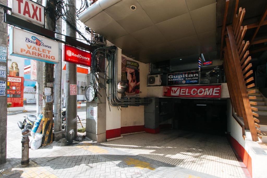 Certifikát, hodnocení, plakát nebo jiný dokument vystavený v ubytování RedDoorz at Timog Avenue Quezon City