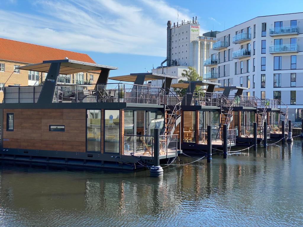 a house on the water in a city at MarinaVilla in Nykøbing Falster