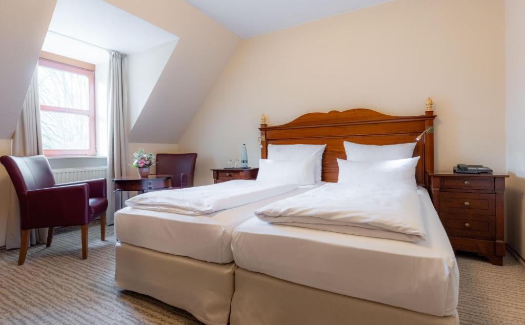 Postel nebo postele na pokoji v ubytování Hotel Engel