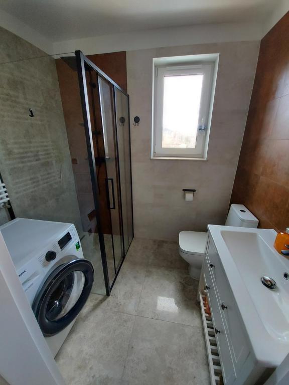 Kúpeľňa v ubytovaní Apartament Zielony