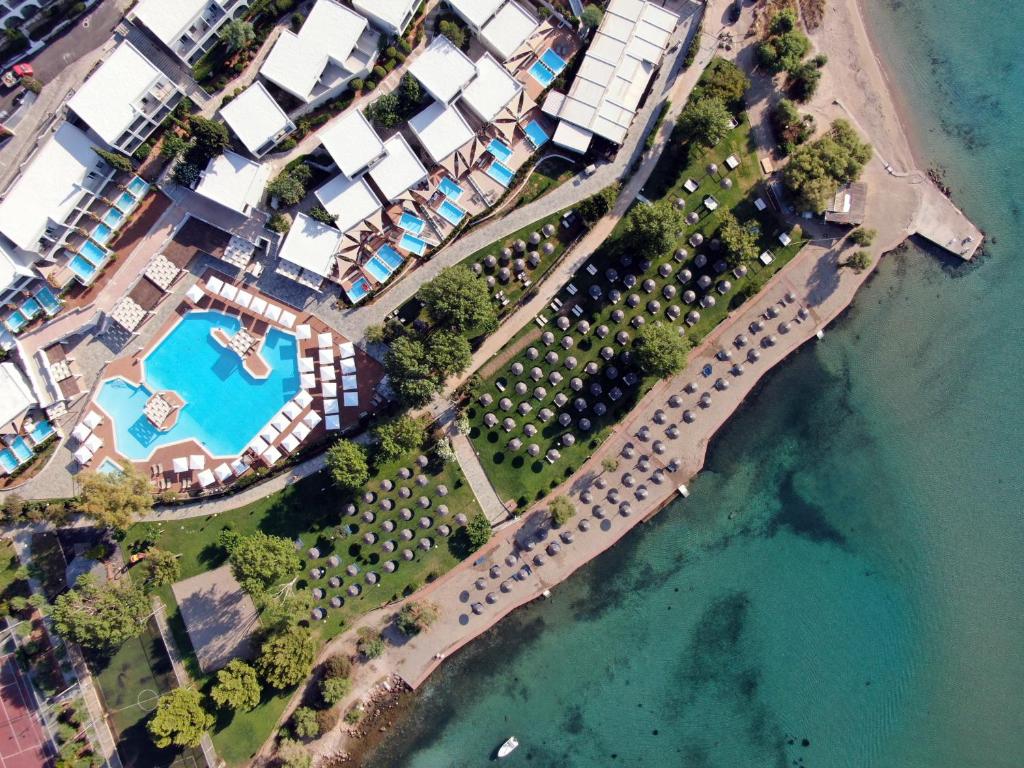 
a large body of water with a beach at Dolce Athens Attica Riviera in Vravrona
