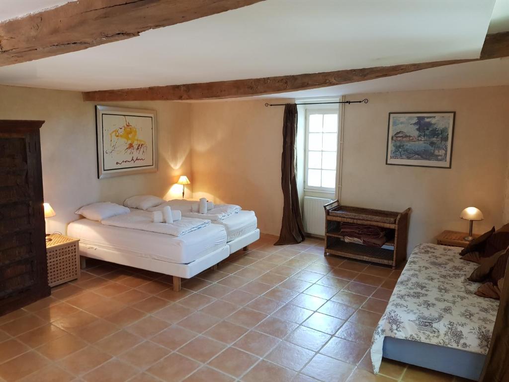Postel nebo postele na pokoji v ubytování Villa Mas