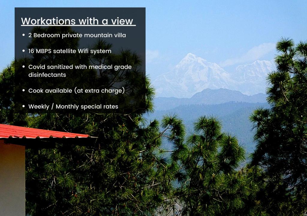a sign with a view of mountains and palm trees at Hostie Sharanam - 2BHK Pvt Mountain Villa, Majkhali in Rānīkhet