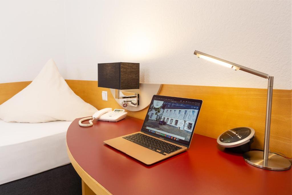 TV a/nebo společenská místnost v ubytování Hotel Alte Mühle