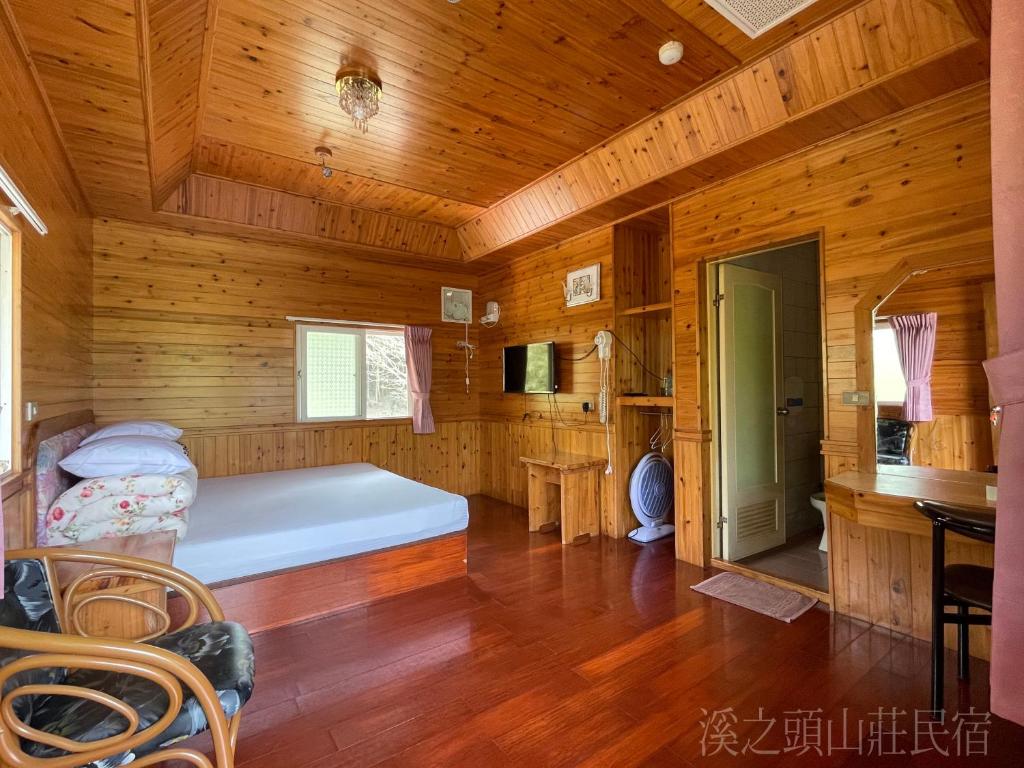 Postel nebo postele na pokoji v ubytování Xi Zhi Tou Homestay