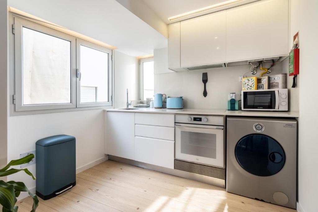Kuchyň nebo kuchyňský kout v ubytování CAROL BEACH HOUSE