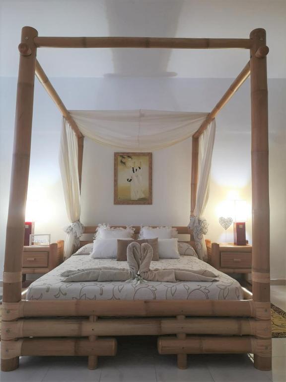 Posteľ alebo postele v izbe v ubytovaní Deluxe Villa with private pool El Duque by Vapagó Tenerife
