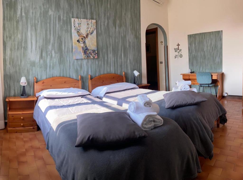 Postel nebo postele na pokoji v ubytování ALBERGO 900Strati
