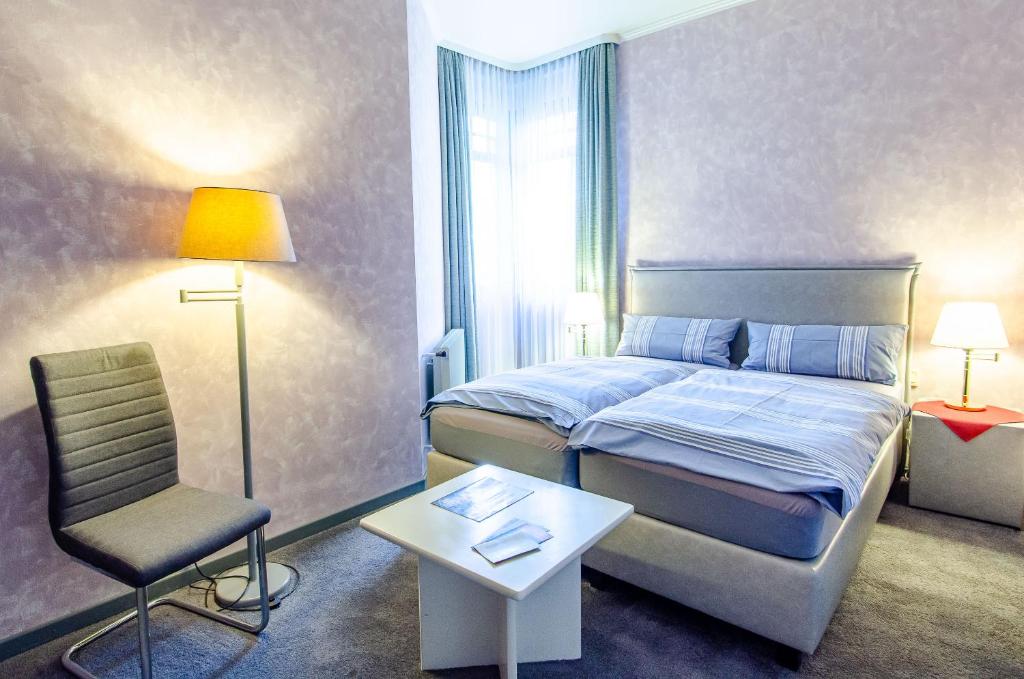 Postel nebo postele na pokoji v ubytování Hotel-Restaurant Ochsen