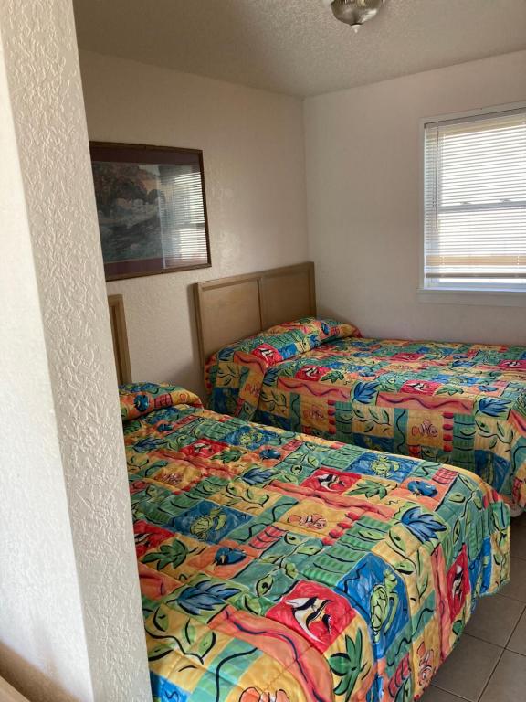 Postel nebo postele na pokoji v ubytování Surfside Motel - Seaside Heights