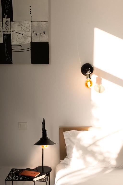 Postel nebo postele na pokoji v ubytování Hotel Marengo
