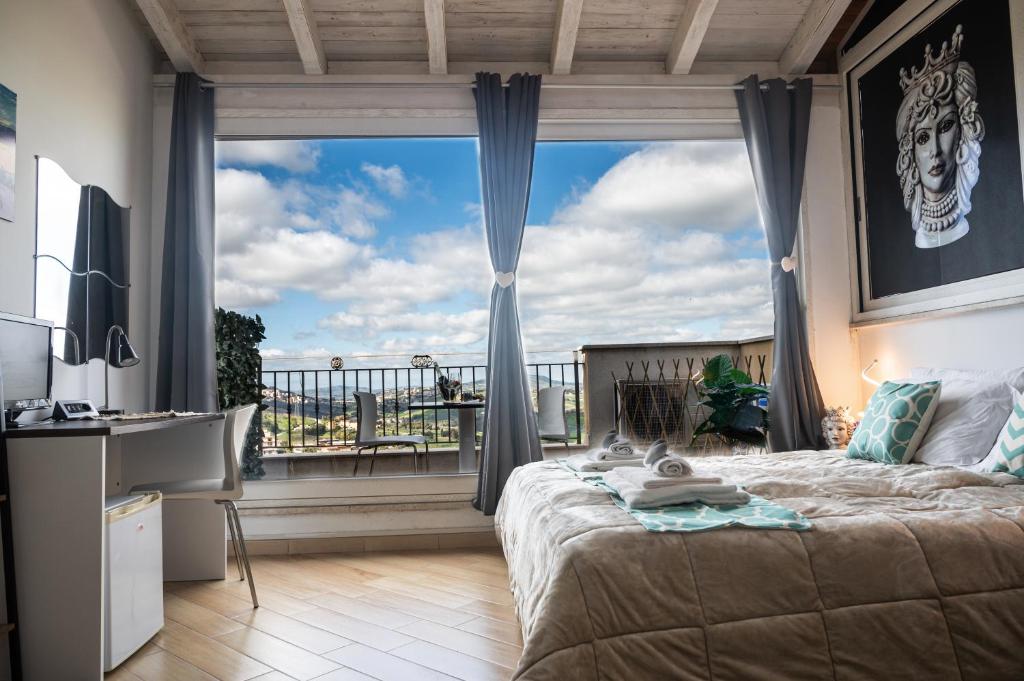 Posteľ alebo postele v izbe v ubytovaní Il Moro - Agrigento Rooms