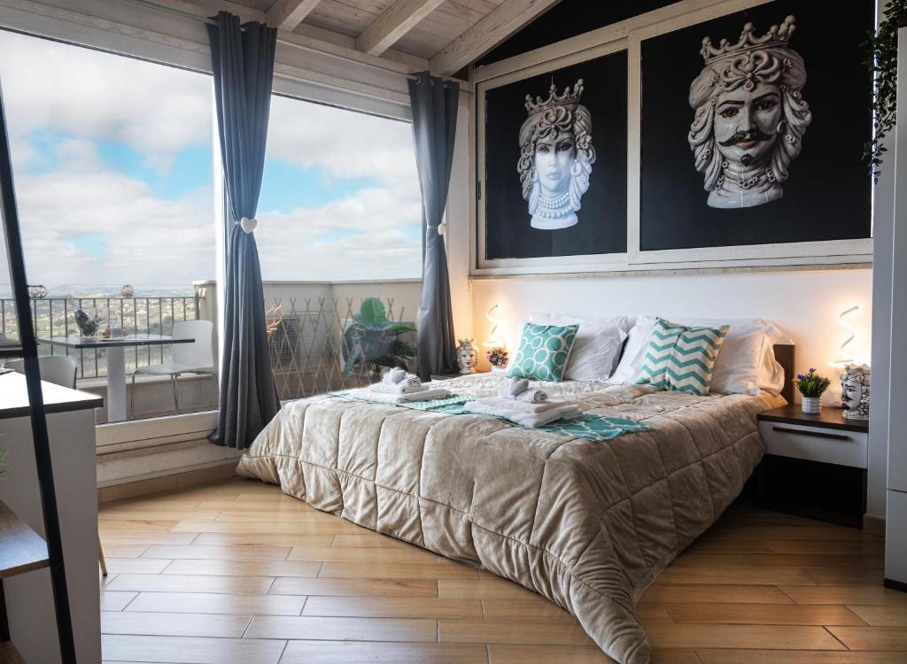 Posteľ alebo postele v izbe v ubytovaní Il Moro - Agrigento Rooms