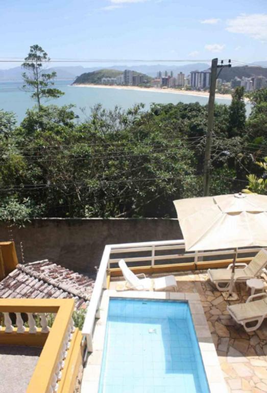  Honey Moon - Vista do mar na cama.