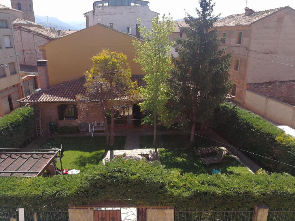 an aerial view of a yard with trees and buildings at Badaran Divino in Badarán