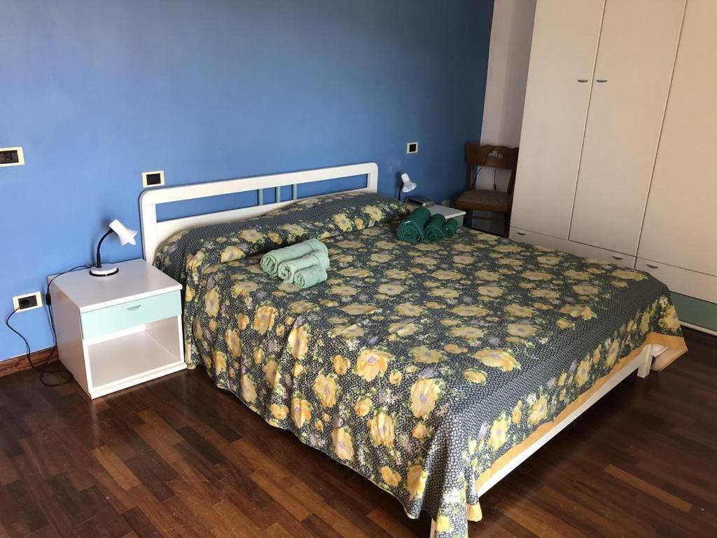 A bed or beds in a room at DaCapo Rooms