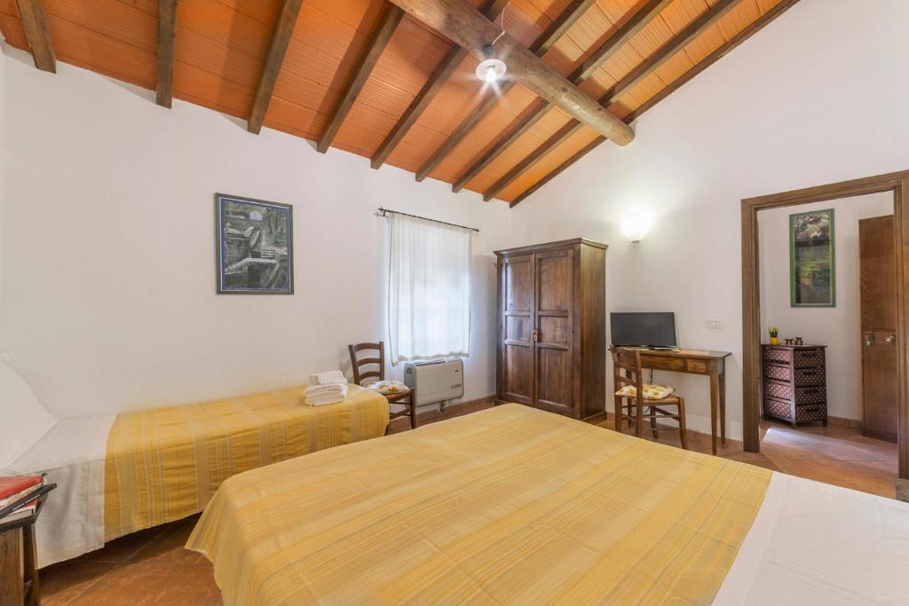 Posteľ alebo postele v izbe v ubytovaní Agriturismo Cappellese