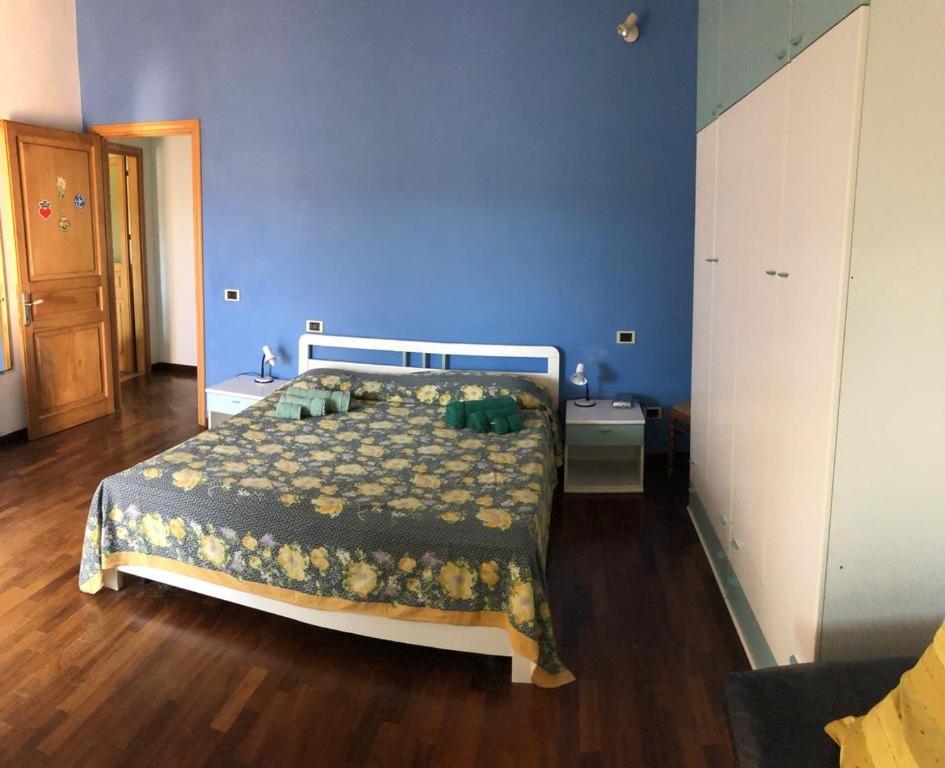 A bed or beds in a room at DaCapo Rooms
