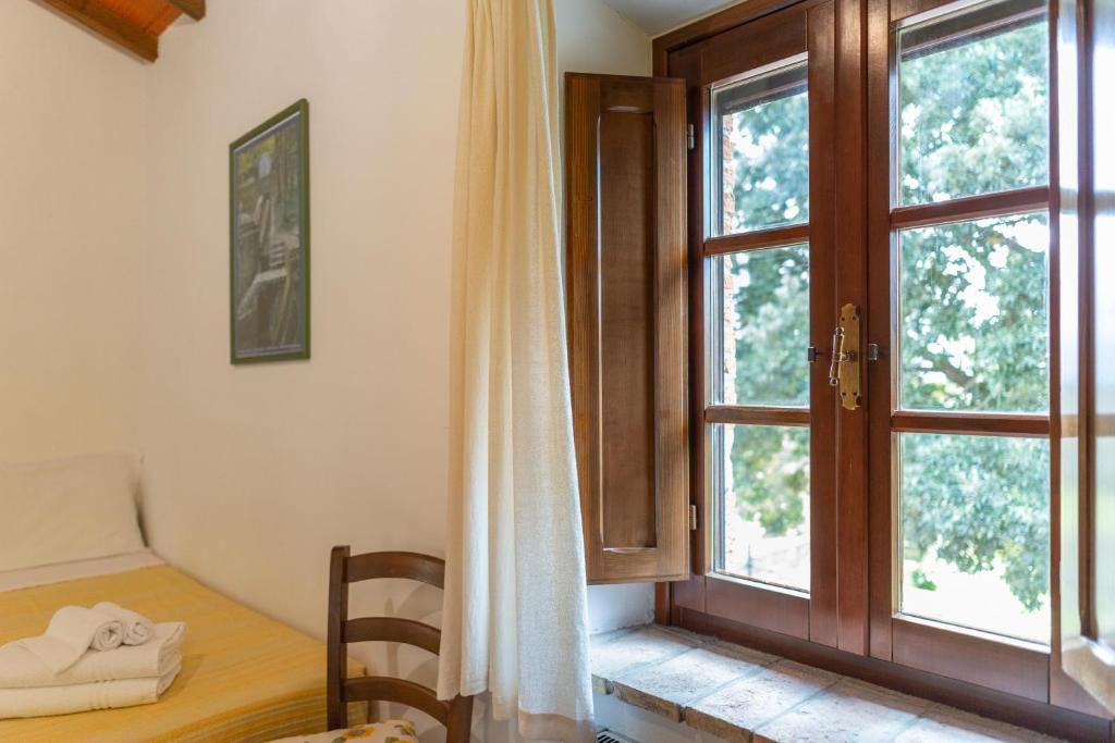 Posteľ alebo postele v izbe v ubytovaní Agriturismo Cappellese