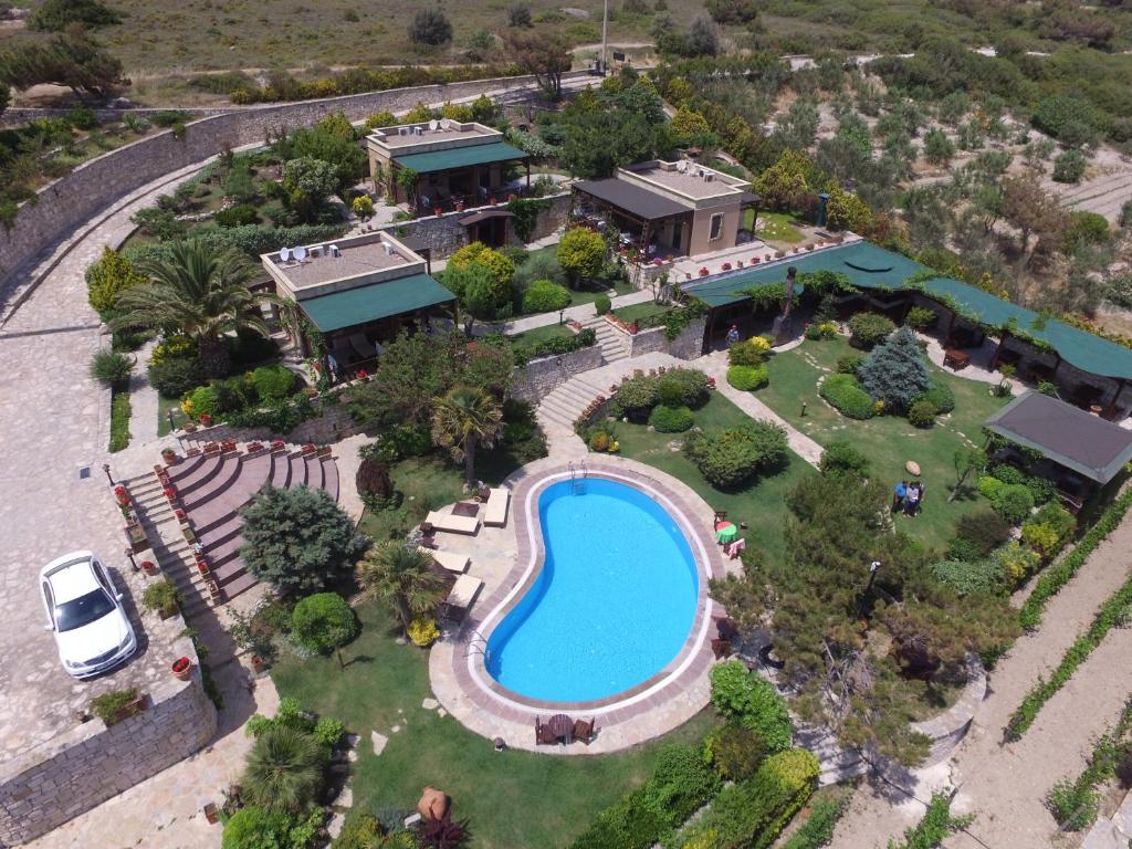 an aerial view of a house with a swimming pool at Ada Bacchus Hotel in Bozcaada