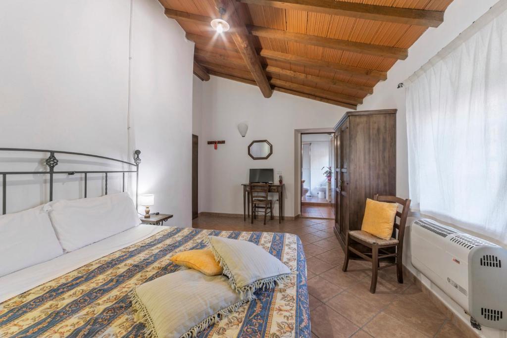 Posteľ alebo postele v izbe v ubytovaní Agriturismo Cappellese