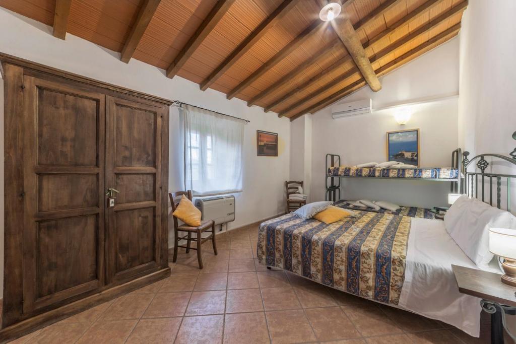 Posteľ alebo postele v izbe v ubytovaní Agriturismo Cappellese