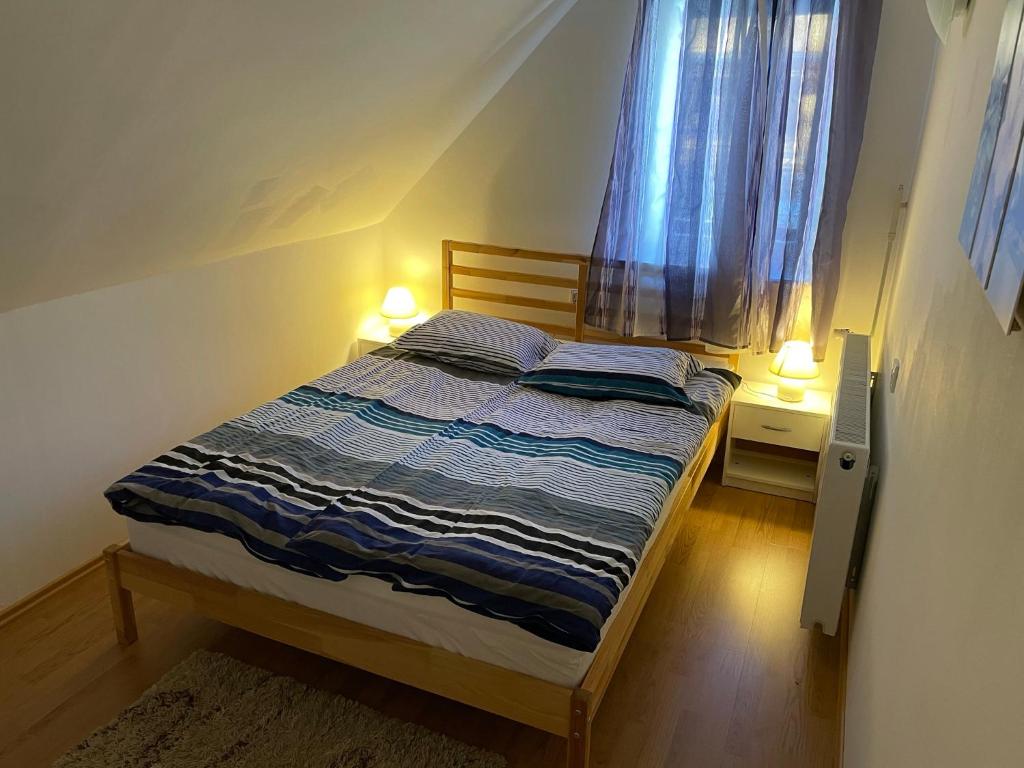 Tempat tidur dalam kamar di Martinov dom