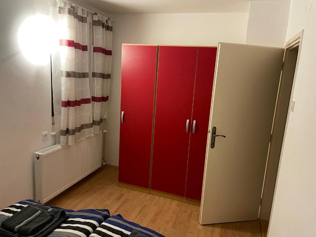 Postel nebo postele na pokoji v ubytování Martinov dom