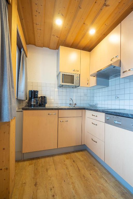 Kuchyň nebo kuchyňský kout v ubytování LEOPOLDINE Apart Zimmer