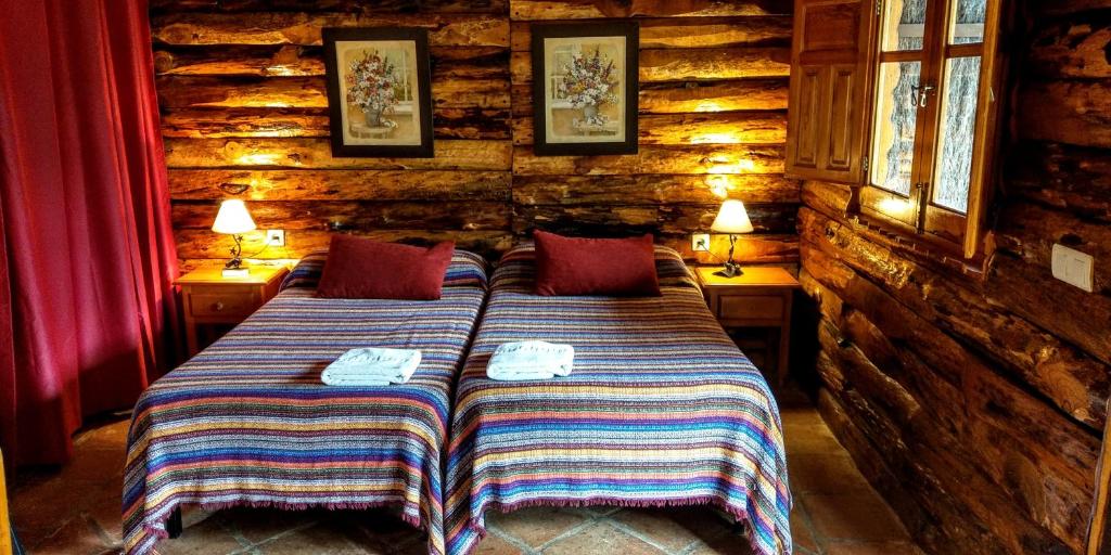 Postel nebo postele na pokoji v ubytování Cabañas Jimera de Líbar