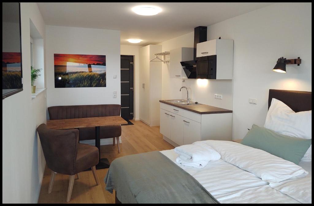 Kuchyň nebo kuchyňský kout v ubytování Fernweg Apartments