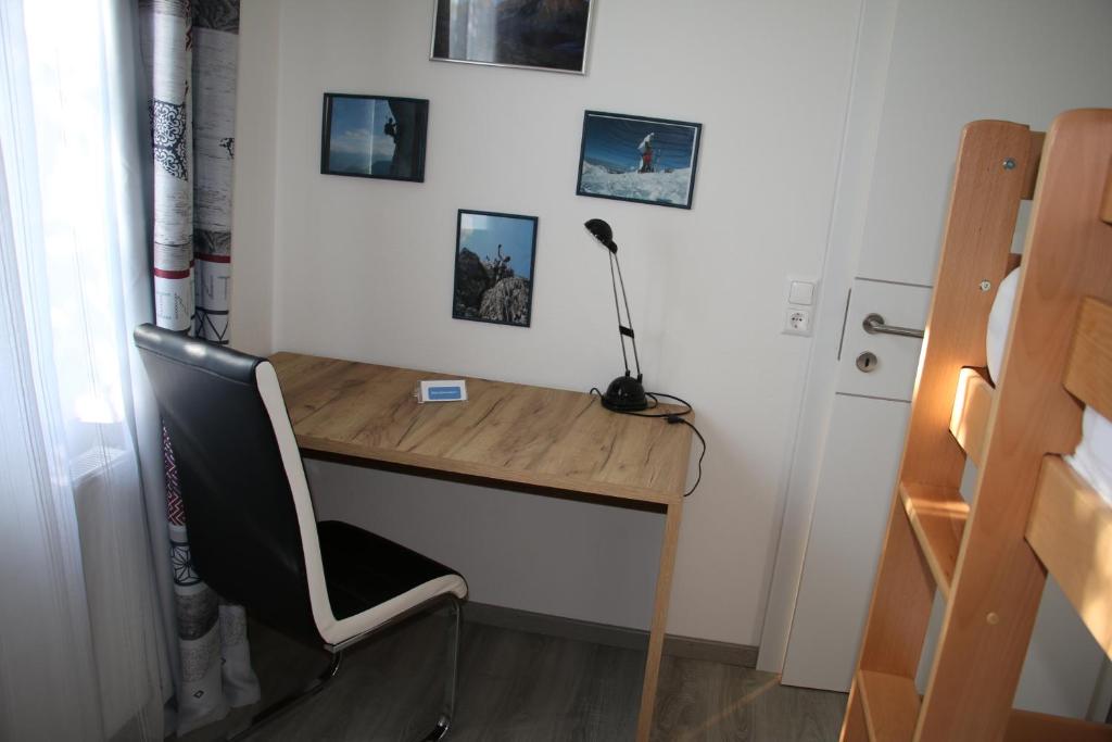 TV a/nebo společenská místnost v ubytování Ferienwohnung Palme