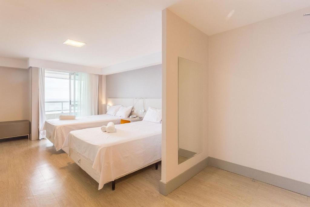  Confortável flat no Hotel Radisson com Café da Manhã
