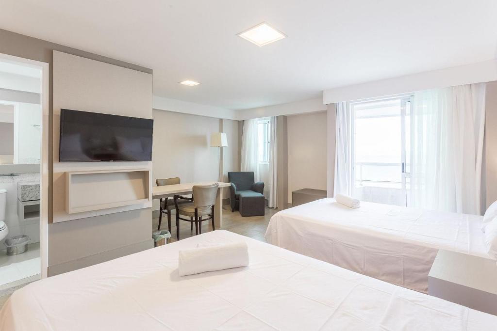  Confortável flat no Hotel Radisson com Café da Manhã
