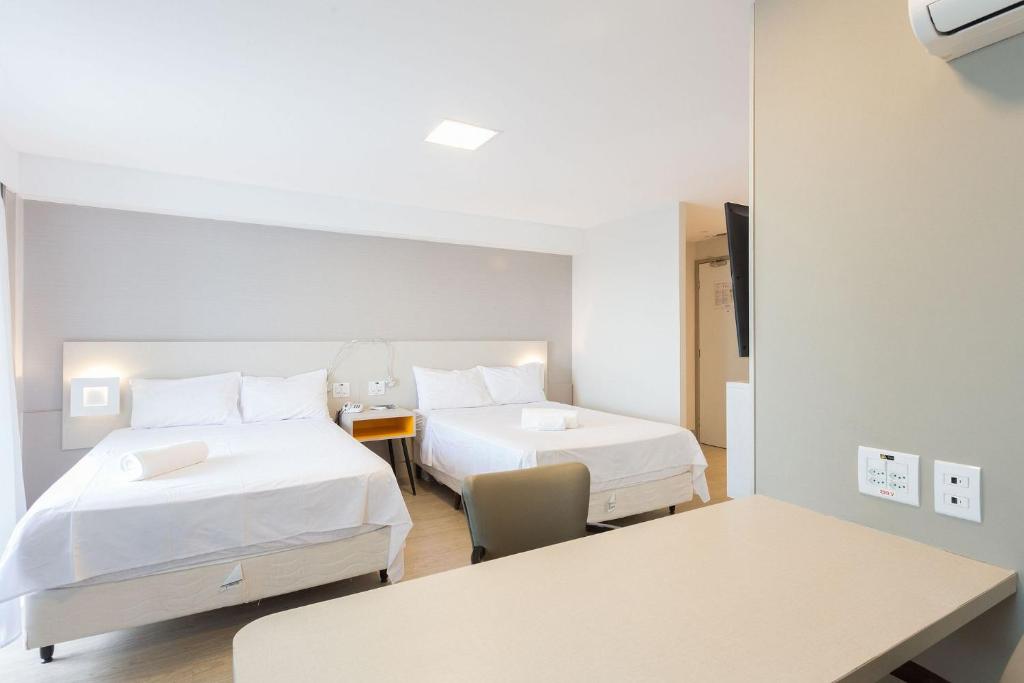  Confortável flat no Hotel Radisson com Café da Manhã