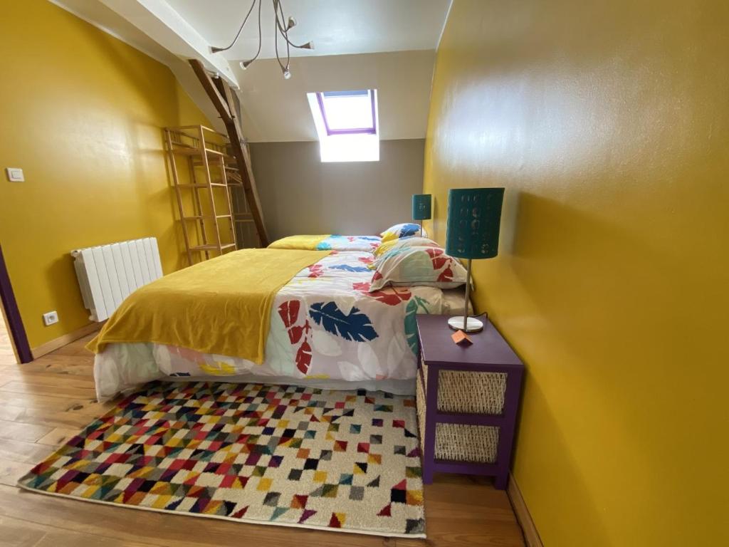 Postel nebo postele na pokoji v ubytování Le Moulin de Razou