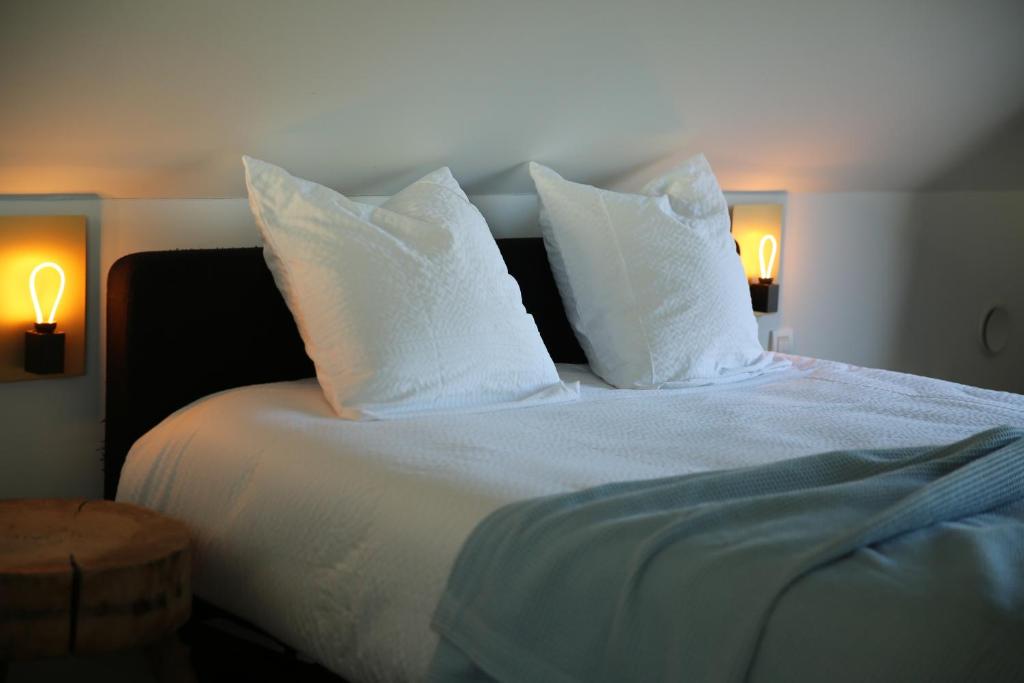 Postel nebo postele na pokoji v ubytování Rozeboom Loft