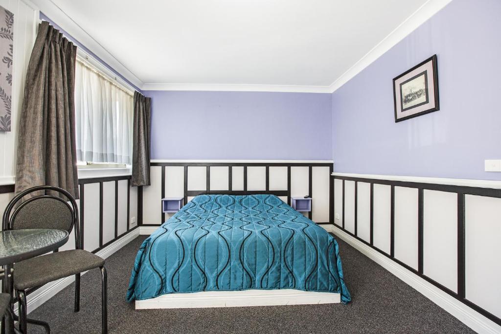 Postel nebo postele na pokoji v ubytování Glen Innes Lodge Motel