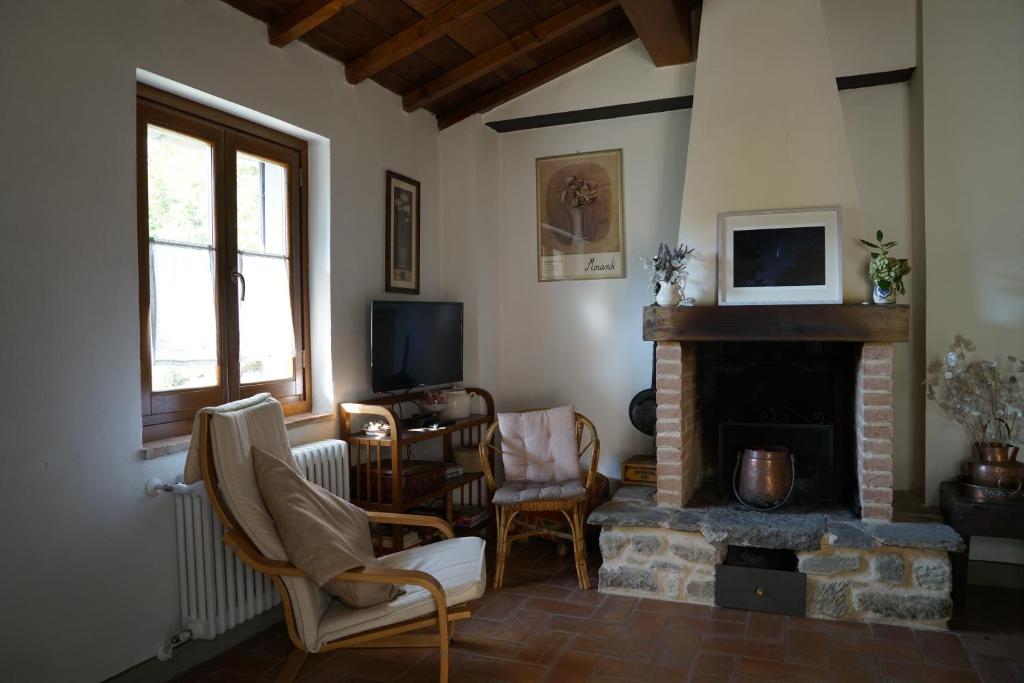 TV a/nebo společenská místnost v ubytování Casa Camporino
