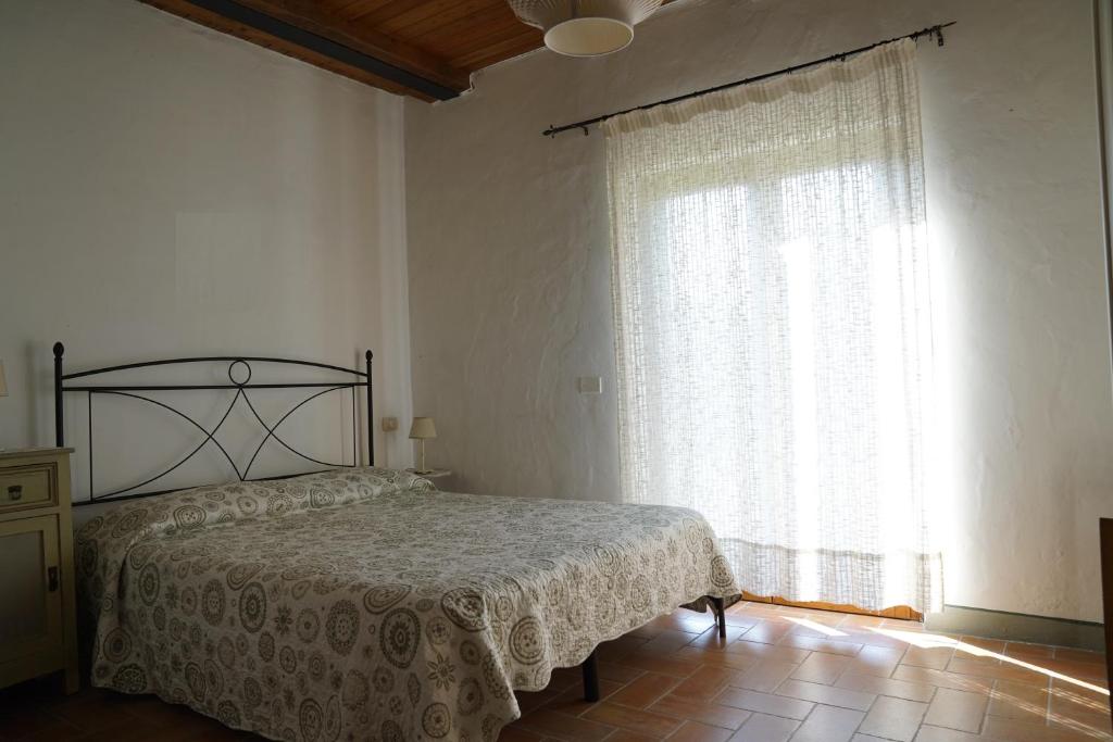 Postel nebo postele na pokoji v ubytování Casa Camporino