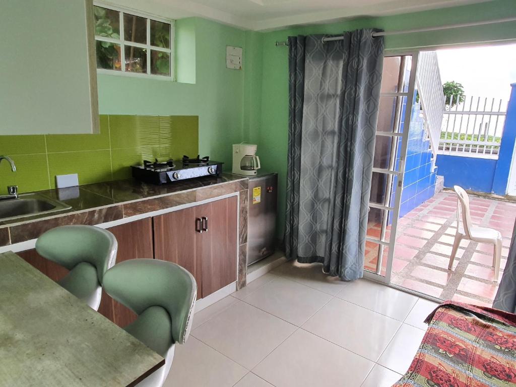 Kuchyň nebo kuchyňský kout v ubytování Apartamentos Sound Bay Beach