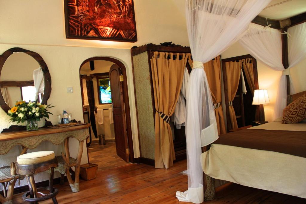 Postel nebo postele na pokoji v ubytování Chui Lodge