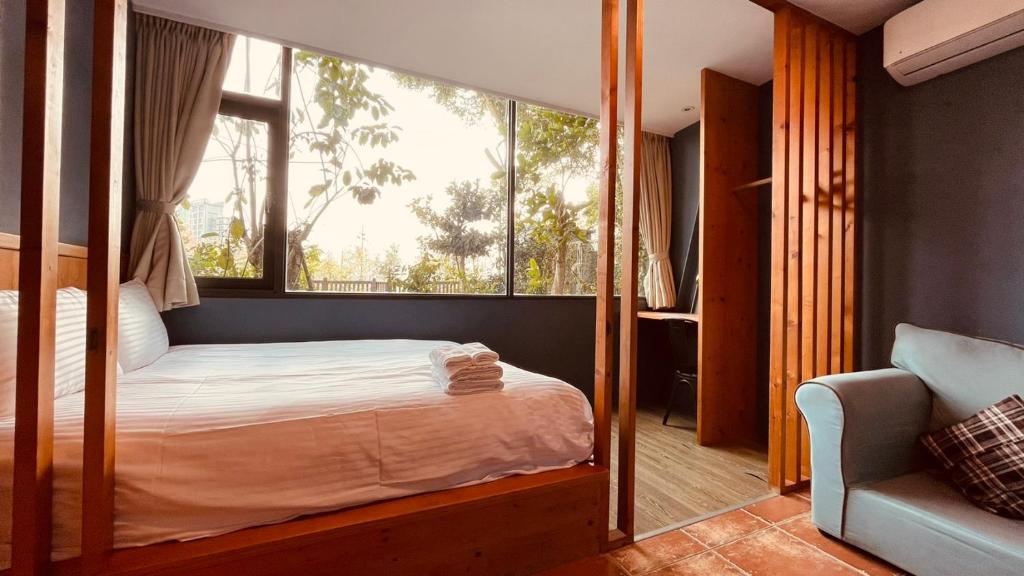 Voodi või voodid majutusasutuse Yue Lake Backpackers toas