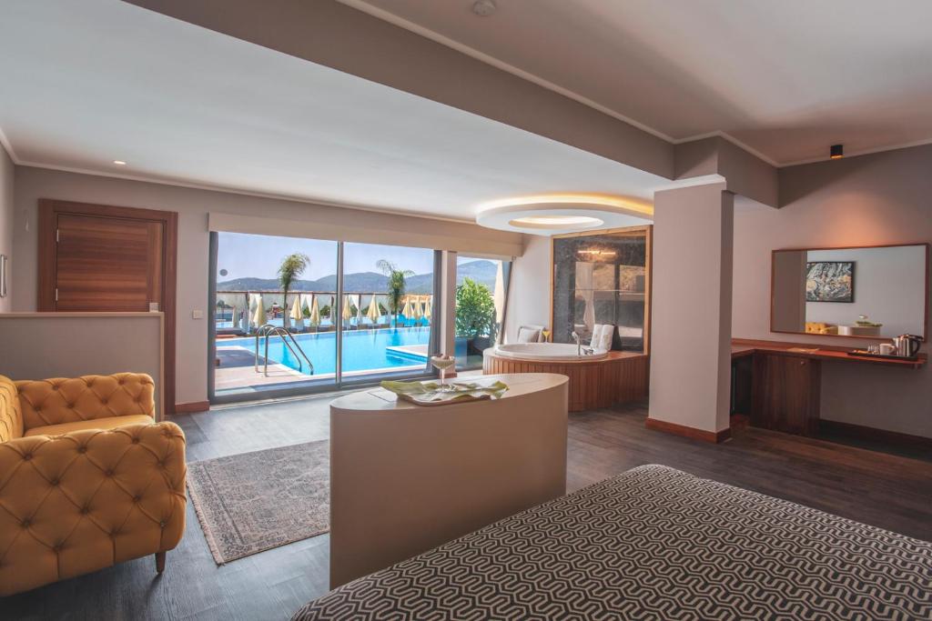 The swimming pool at or close to Orka Cove Hotel Penthouse & Suites Adults Only