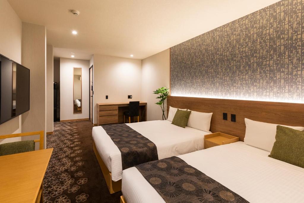 TV a/nebo společenská místnost v ubytování Chiyokura HOTEL SHUKU Nagoya