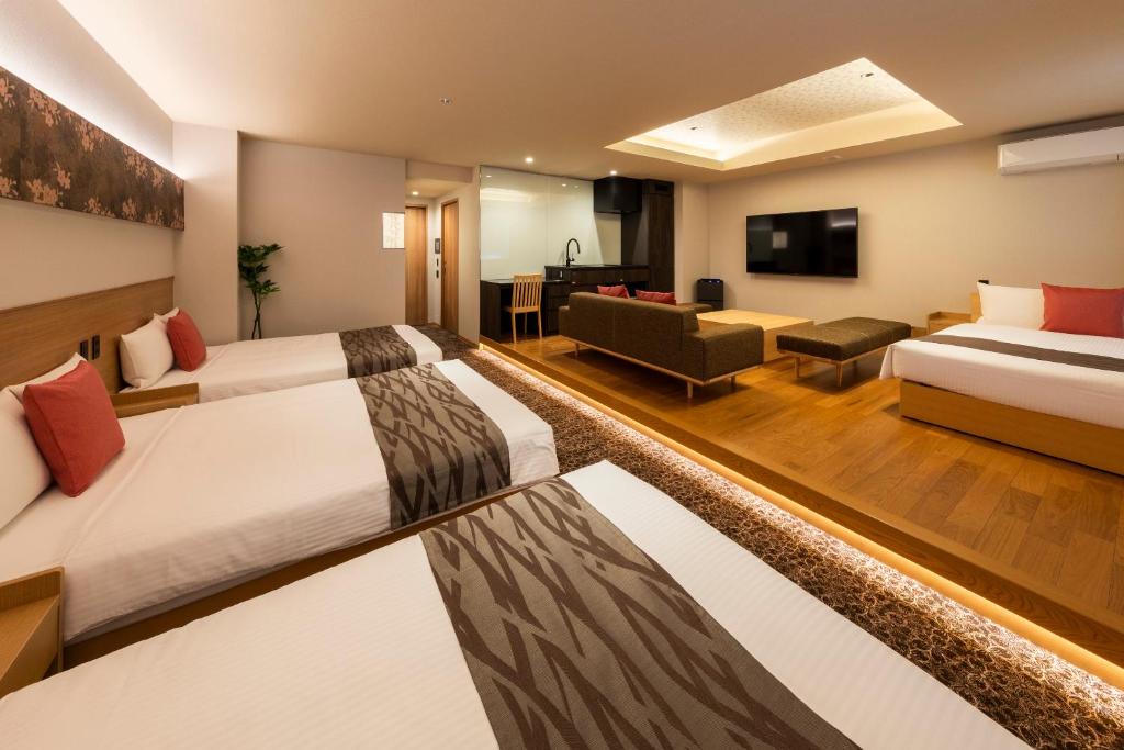 TV a/nebo společenská místnost v ubytování Chiyokura HOTEL SHUKU Nagoya