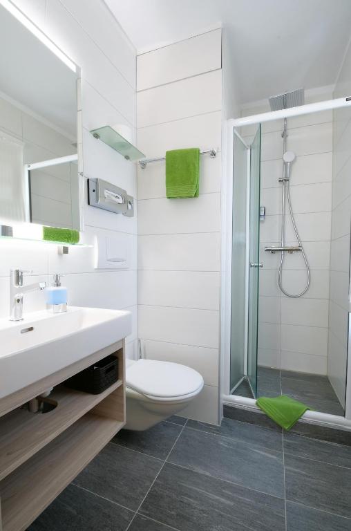 Koupelna v ubytování Hotel La Perla